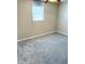 Bedroom featuring carpet floors, neutral wall color, and a window with blinds at 7724 Linsley Dr, North Charleston, SC 29418