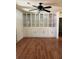 Living room features custom built-in cabinetry and hardwood floors at 7724 Linsley Dr, North Charleston, SC 29418