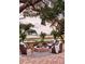 Picturesque outdoor space with comfortable seating around a fire pit, perfect for enjoying scenic waterfront views at 791 Hughes Rd, Johns Island, SC 29455