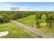Aerial view of property at 8A Duffers Ct. set amidst a golf course with lush landscaping and scenic views at 8 Duffers Ct. # A, Charleston, SC 29414
