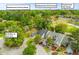 Expansive aerial view showcases Shadowmoss golf community, driving range, golf course, clubhouse, and 8A Duffers Ct at 8 Duffers Ct. # A, Charleston, SC 29414