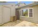 A cozy backyard featuring a door to the outside and a large window for ample light at 8 Duffers Ct. # A, Charleston, SC 29414