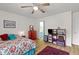 Bedroom with wood floors, ceiling fan, and bright furnishings, offering ample space at 8 Duffers Ct. # A, Charleston, SC 29414
