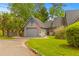 Charming home featuring an attached garage and an American flag waving in the breeze at 8 Duffers Ct. # A, Charleston, SC 29414