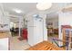 Bright kitchen with an open doorway to the dining and living rooms at 8 Duffers Ct. # A, Charleston, SC 29414