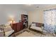 Inviting living room featuring a bookshelf, side table and stylish accents, perfect for reading or relaxation at 8 Duffers Ct. # A, Charleston, SC 29414