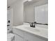 Bathroom featuring a white vanity, black hardware, toilet, and shower/tub combination at 8001 Hydrangea Ln, Hanahan, SC 29410