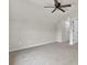 Bedroom features neutral walls, carpeted floors, a ceiling fan, and a closet at 8001 Hydrangea Ln, Hanahan, SC 29410