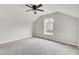 The bedroom includes a ceiling fan, neutral walls, carpeted floors, and a window at 8001 Hydrangea Ln, Hanahan, SC 29410