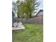 Spacious fenced backyard offers a private outdoor living space with new patio and chairs at 928 Sycamore Ave, Charleston, SC 29407