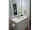 Elegant bathroom vanity featuring a quartz countertop and white cabinetry at 928 Sycamore Ave, Charleston, SC 29407