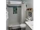 Bright bathroom with tiled shower, neutral accents, and modern fixtures at 928 Sycamore Ave, Charleston, SC 29407