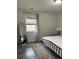 Bedroom featuring neutral walls, decorative rug, and full length mirror at 928 Sycamore Ave, Charleston, SC 29407