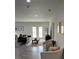 Open-concept living area featuring stylish furniture, natural light, and modern accents at 928 Sycamore Ave, Charleston, SC 29407