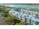 Beautiful aerial view of waterfront townhomes featuring private balconies and peaceful scenery at 1011 Lighterman Way, Charleston, SC 29412