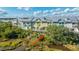 Scenic aerial view of waterfront townhomes featuring balconies overlooking the tranquil marsh and trees at 1011 Lighterman Way, Charleston, SC 29412