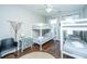 Bright bedroom featuring two bunk beds, stylish decor, and a comfortable seating area at 1011 Lighterman Way, Charleston, SC 29412