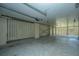 Spacious garage with ample parking and storage space for vehicles and equipment at 1011 Lighterman Way, Charleston, SC 29412