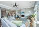 Inviting living room boasts stylish decor, fireplace, open floorplan, and seamlessly connects to the kitchen at 1011 Lighterman Way, Charleston, SC 29412