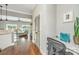 Office space with granite desktop, chair, and view to kitchen, living area, and outdoor space at 1011 Lighterman Way, Charleston, SC 29412