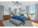 Bright bedroom with natural light, hardwood floors, and comfortable furnishings at 1075 Avenue Of Oaks, Charleston, SC 29407