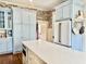 Charming kitchen boasting a quartz countertop, ample storage, and stainless steel appliances at 1075 Avenue Of Oaks, Charleston, SC 29407