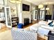 Bright living room featuring a fireplace, hardwood floors, and stylish furnishings, creating a welcoming atmosphere at 1075 Avenue Of Oaks, Charleston, SC 29407