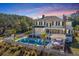 Stunning backyard view with pool, pergola, well maintained lawn, and privacy fence at 1075 Avenue Of Oaks, Charleston, SC 29407