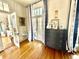 Charming sitting room featuring hardwood floors, blue and white accents, and ample natural light at 1075 Avenue Of Oaks, Charleston, SC 29407