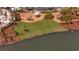 An aerial view of a playground near a lake and lush green space at 113 Grimball St, Summerville, SC 29486