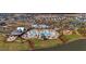 Aerial view of a large community pool and splashpad alongside a community clubhouse at 113 Grimball St, Summerville, SC 29486