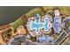Aerial view of a community pool and splashpad alongside a community clubhouse at 113 Grimball St, Summerville, SC 29486
