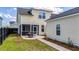 Lovely backyard with a screened-in porch and patio, perfect for outdoor dining and entertaining at 113 Grimball St, Summerville, SC 29486