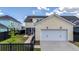 Property with a screened-in porch, a patio, a well-manicured lawn, and a convenient two-car garage at 113 Grimball St, Summerville, SC 29486