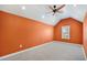 Bright bedroom features a ceiling fan, neutral carpet, and a window that allows natural light to flood the space at 113 Grimball St, Summerville, SC 29486