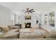Cozy living room featuring a fireplace, comfortable seating, neutral color palette, and plenty of natural light at 113 Grimball St, Summerville, SC 29486