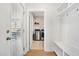 Convenient mud room with laundry area, storage, and bench seating near the entrance at 113 Grimball St, Summerville, SC 29486
