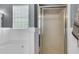 This bathroom shows a luxurious soaking tub and a glass-enclosed shower at 117 Back Tee Cir, Summerville, SC 29485