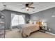 Comfortable bedroom featuring a ceiling fan, neutral color palette, and ample natural light at 117 Back Tee Cir, Summerville, SC 29485
