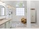 Remodeled bathroom features granite countertop vanity and walk-in shower with white subway tiles at 1177 Old Ivy Way, Mount Pleasant, SC 29466