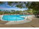 Large community pool with lounge chairs and umbrellas for a relaxing day in the sun at 1177 Old Ivy Way, Mount Pleasant, SC 29466