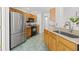 Functional kitchen featuring wooden cabinets, granite countertops, and stainless steel appliances for modern convenience at 1177 Old Ivy Way, Mount Pleasant, SC 29466