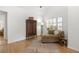 Relaxing living room with vaulted ceilings, a sitting chair, and a woven rug at 1177 Old Ivy Way, Mount Pleasant, SC 29466