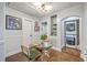 Charming dining area with a glass table, stylish chairs, and convenient access to the laundry at 1188 Camden St, North Charleston, SC 29405