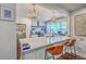 Modern kitchen featuring a spacious island with seating, sleek countertops, and stainless steel appliances at 1188 Camden St, North Charleston, SC 29405