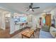 Open-concept living area with a view of the kitchen, showcasing hardwood floors and comfortable seating at 1188 Camden St, North Charleston, SC 29405