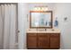 Bathroom with vanity sink, large mirror, and shower with white shower curtain at 120 Fresh Meadow Ln, Mount Pleasant, SC 29466