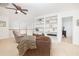 Upstairs living room with built-in shelving and comfortable seating at 120 Fresh Meadow Ln, Mount Pleasant, SC 29466