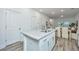 Modern kitchen with granite counters and stainless steel appliances and eat-in island seating at 1201 Twin Rivers Dr, Wando, SC 29492