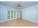 Bright bedroom featuring hardwood floors, large windows and ceiling fan at 123 Tiffany Ln, Summerville, SC 29485